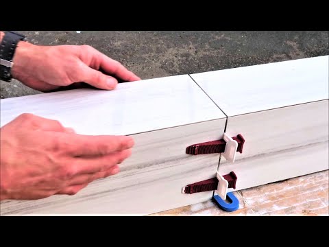 Видео: Современный душевой бордюр из керамогранита с пазами