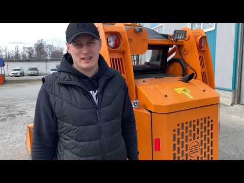 Видео: Обзор мини-погрузчика АМКОДОР 211