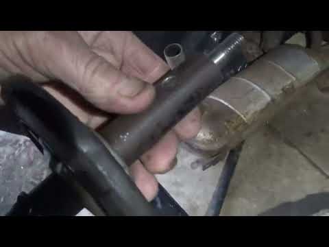 Видео: Будни пенсионера, переделка подвески снегохода Буран. часть 1.