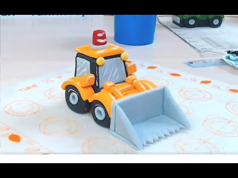 Видео: Бульдозер из мастики /how to make a bulldozer cake topper machine/ Escovadora para terraplenagem
