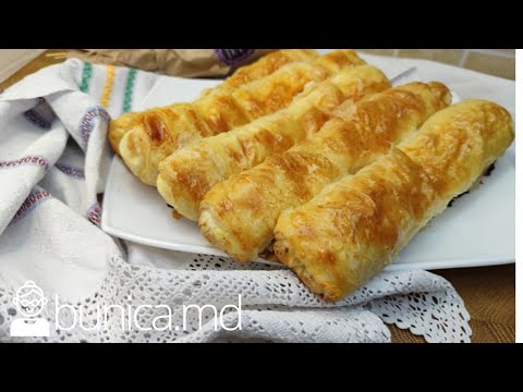 Видео: Plăcinte foioase cu foi fine umplute cu brânză. Слоёные молдавские плацынды с творогом.