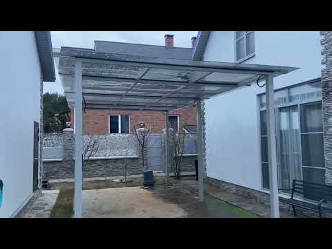 Видео: Короткий обзор навеса из монолитного поликарбоната.  купить монолитный поликарбонат можно у нас