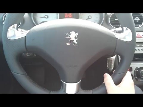 Видео: Снятие рулевого колеса Пежо 308 без проколов