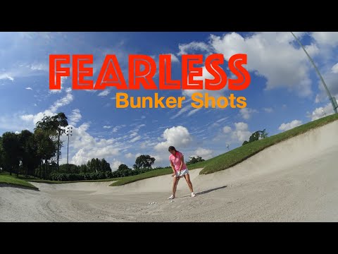 Видео: Бесстрашные удары из бункера — гольф с Мишель Лоу