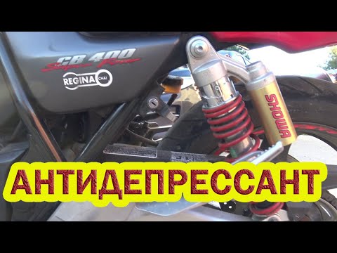 Видео: Отчет. Первый сезон на Honda CB 400 Super Four Vtec.