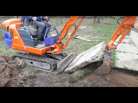 Видео: На что способен HITACHI EX15-2.Услуги мини экскаватора.Мини экскаватор в работе.