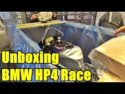 Видео: BMW HP4 RACE Unboxing. Достаем из коробки мотоцикл за 5,5 миллионов рублей