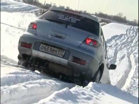 Видео: Тест-драйв - Mitsubishi Pajero & Mitsubishi Outlander (2007)