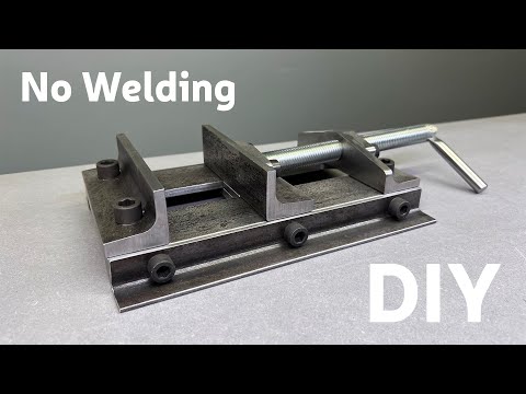Видео: Изготовление металлических тисков для сверлильного станка без сварки | Самодельные тиски для свер...