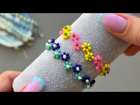 Видео: Как сделать браслет из бисера с зигзагообразными цветами