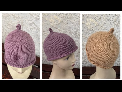 Видео: Шапка с петелькой на макушке
