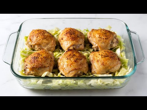 Видео: Куриные бедра с капустой простой рецепт в духовке
