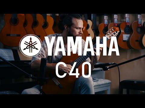 Видео: Yamaha C40 Классическая гитара ОБЗОР - Гитара для музыкальной школы