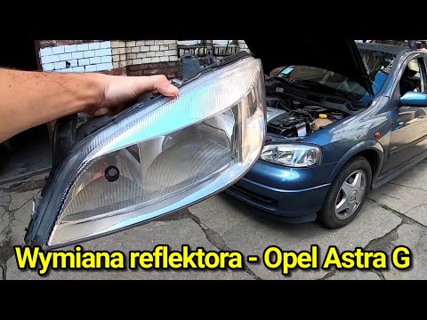 Видео: Как заменить фару (лампу) на Опель Астра G II? Замена разборка лампочки фары