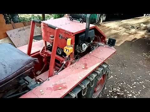 Видео: самодельный гусеничный трактор. немного переделал.