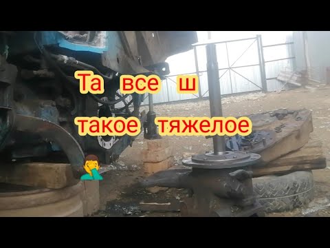 Видео: Т 40.снятие бортовых,чулков, замена сальников на полуосях