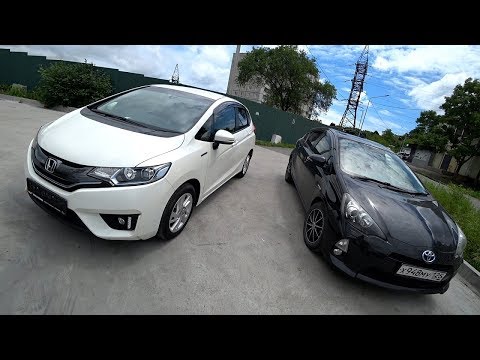 Видео: Honda Fit 1.5 Hybrid 2014 - Получили посылку от Honda