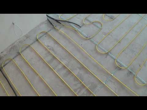 Видео: Укладка теплого пола, кабель Veria. Подключение нескольких кабелей к одному регулятору.