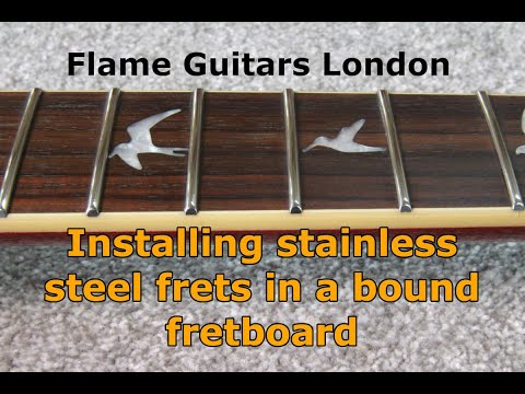 Видео: Установка ладов из нержавеющей стали в накладку грифа