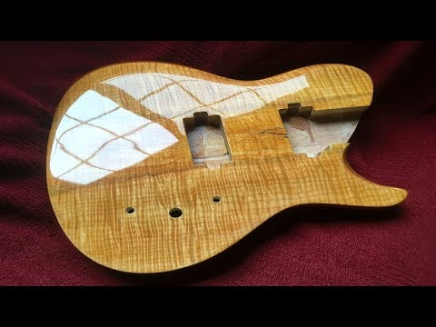 Видео: Эпизод 121. Отделка гитары пигментами Crystalac CraftNique и финишным покрытием Brite Tone Instru...