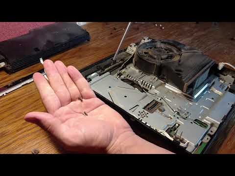 Видео: Разборка чистка PS3 Slim