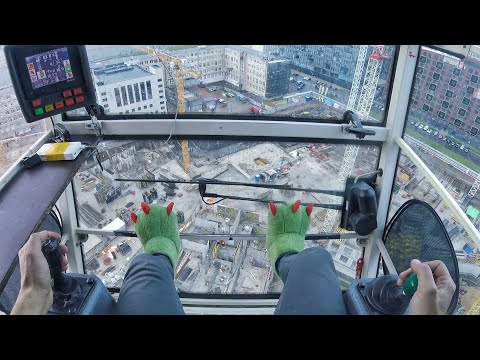 Видео: МЧС предупреждает - крановщики работают. Реакция башенного крана на сильный ветер.