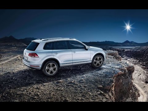Видео: VW Touareg NF Замена ксеноновой лампы ближнего света