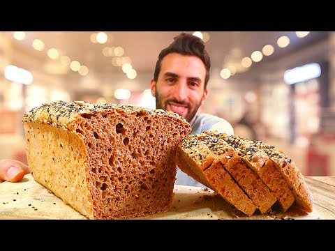 Видео: Пышный хлеб с цельнозерновой мукой и семенами (лучший домашний цельнозерновой хлеб)
