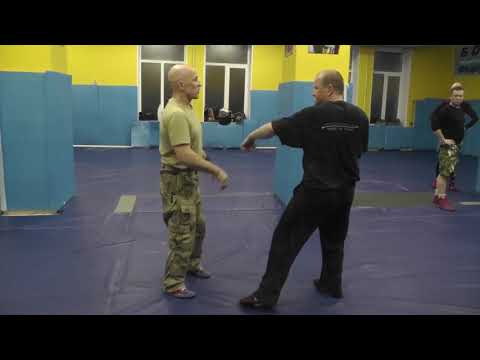 Видео: В. Н. Крючков.  Защита проворотом в точке контакта.