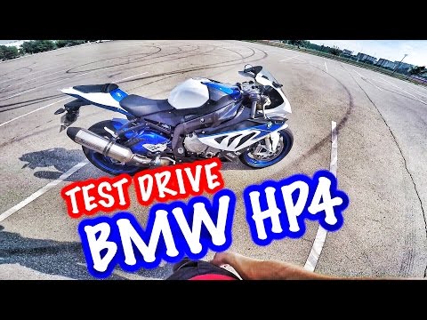 Видео: Тест-драйв спортбайка BMW HP4 S1000RR 2014