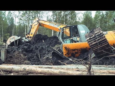 Видео: Экскаватор JCB в торфяной ловушке | JCB excavator in a peat trap