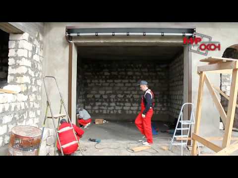 Видео: Монтаж гаражной  роллеты ALUTECH профиль AG77 c улитками на радиоуправлении