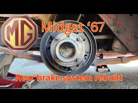 Видео: Переборка задней тормозной системы MG Midget '67