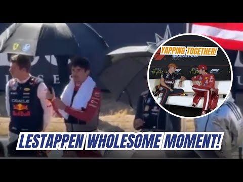 Видео: Шарль Леклер с трудом удерживает зонтик для Макса Ферстаппена при сильном ветре 😂