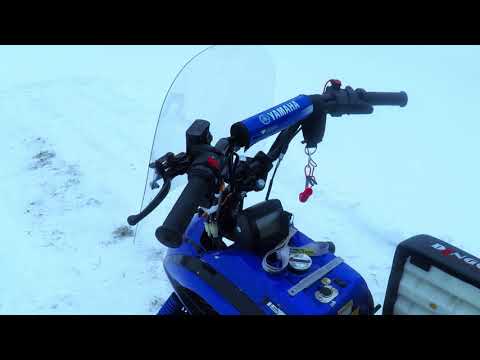Видео: Снегоход Irbis DINGO T150. Установка размыкателя массы и защитных щитков на руль.