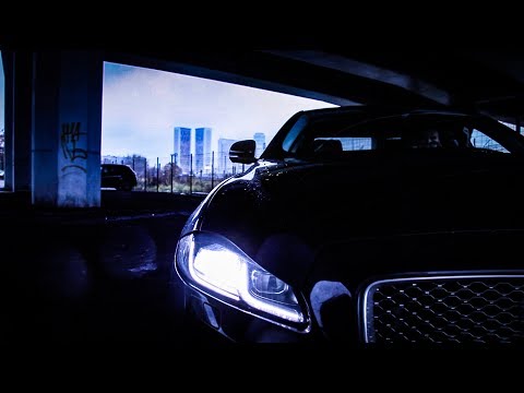 Видео: Представительский седан по-английски - тест-драйв Jaguar XJ