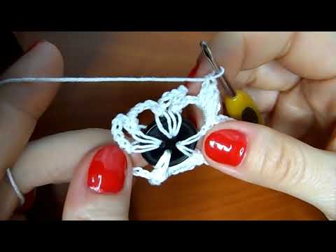 Видео: Как обвязать пуговицы крючком