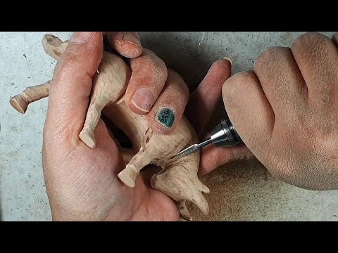 Видео: Резьба по дереву быка с помощью Dremel