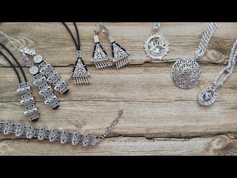 Видео: ЯКУТСКОЕ серебро 925 пробы КАУЧУК СЕРЬГИ подвески КОЛЬЕ