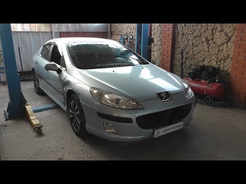 Видео: Замена катриджа нижней опоры двигателя на Peugeot 407 1,8 Пежо 407 2005 года