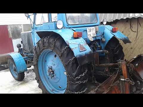 Видео: МТЗ 80 и цепи противоскольжения.