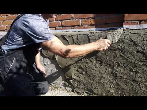 Видео: Подготовка и штукатурка цоколя для имитации камня