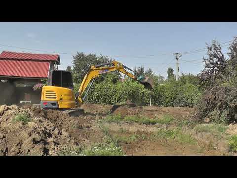 Видео: Работа на мини экскаваторе. XCMG XE55U