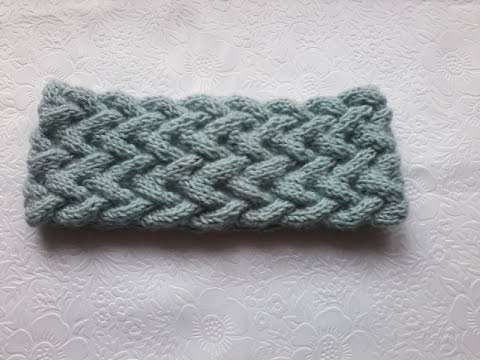 Видео: Вязание повязки на голову узором из кос.