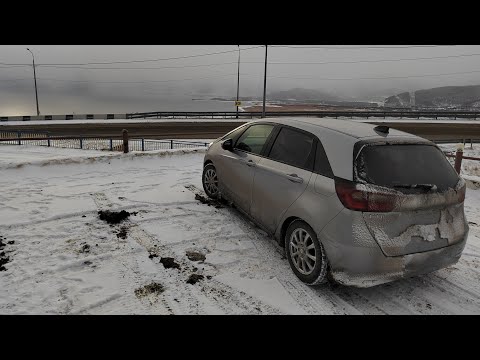 Видео: #8 Зимний перегон Honda Fit 2020. Попал в пургу и метель на Байкале. Заснеженный Култукский перевал.