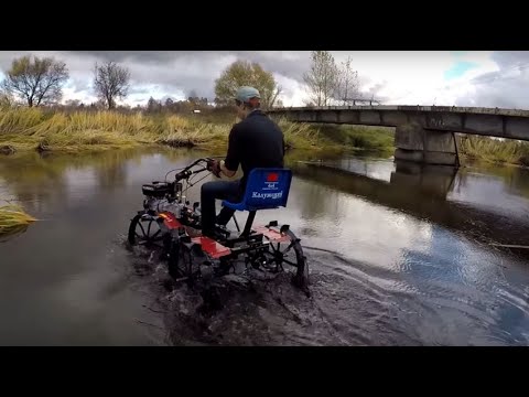 Видео: Мотоблок УГРА 4Х4 (полноприводной мототрактор)