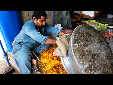 Видео: Пакистанская уличная еда - Лучший куриный бирьяни! Карачи Пакистан