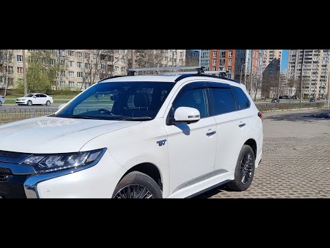 Видео: Поперечины - рейлинги Outlander Phev