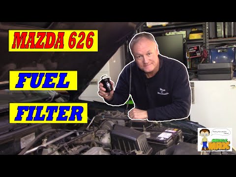 Видео: Замена топливного фильтра Mazda 626