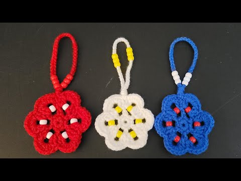 Видео: Вязаная крючком игрушка-браслет "Цветок-фиджет"